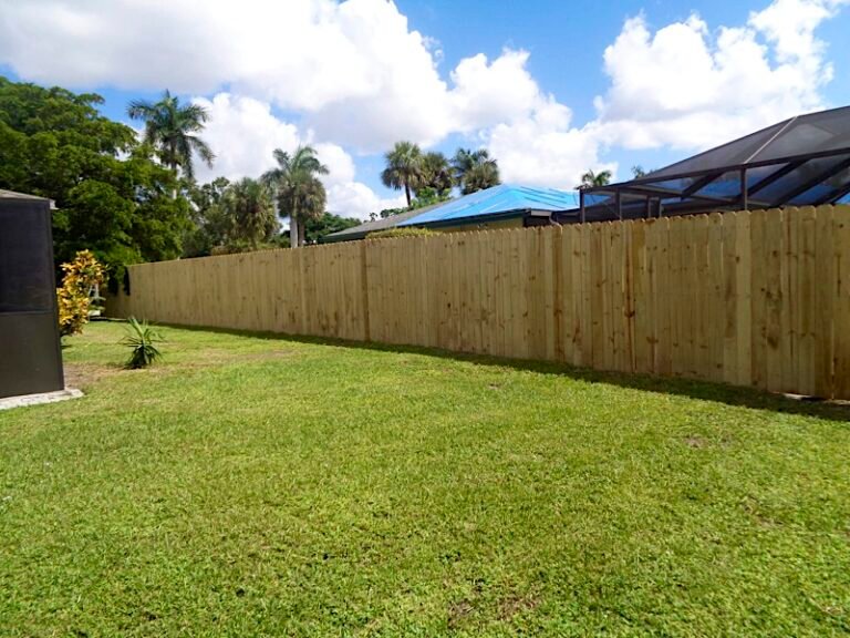 Wood privacy fence in a Southwest Florida backyard